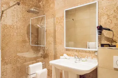 Salle de bains dans l'établissement Hotel des Iris