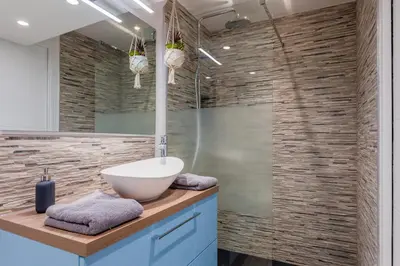 Salle de bains dans l'établissement Le Quai amiénois - Nid douillet moderne face à la Cathédrale