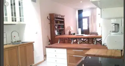 Cuisine ou kitchenette dans l'établissement Gîte le tréportais