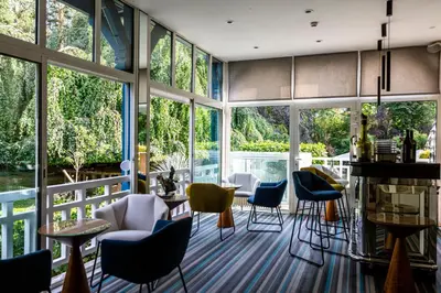 Coin salon dans l'établissement Le Jardin des Plumes