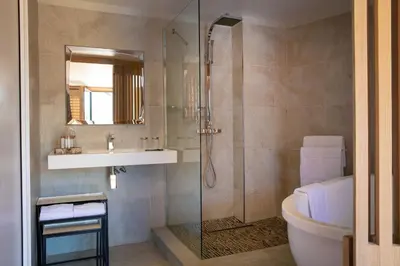 Salle de bains dans l'établissement Le Jardin des Plumes