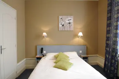 Un ou plusieurs lits dans un hébergement de l'établissement Grand Hotel de L'Univers