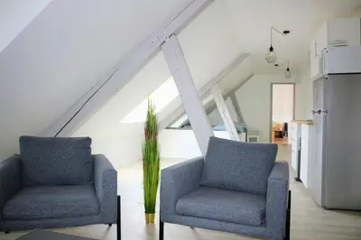 Coin salon dans l'établissement Appartements Up & Down by Beds76
