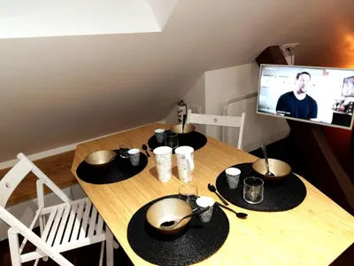 Télévision ou salle de divertissement dans l'établissement Appartements Up & Down by Beds76