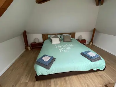 Un ou plusieurs lits dans un hébergement de l'établissement Chambre ambiance campagne chic