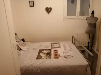 Un ou plusieurs lits dans un hébergement de l'établissement appartement type f2 proche PARIS 25 KM