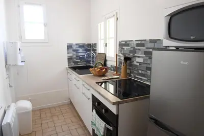 Cuisine ou kitchenette dans l'établissement La Belle Onde