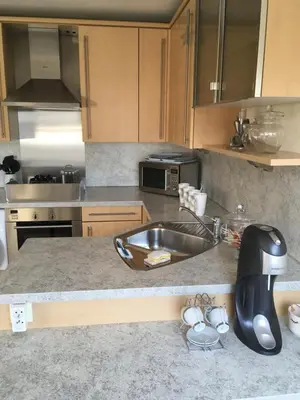 Cuisine ou kitchenette dans l'établissement Duplex residence d'orléans