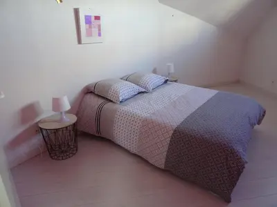 Un ou plusieurs lits dans un hébergement de l'établissement Duplex residence d'orléans