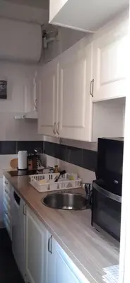 Cuisine ou kitchenette dans l'établissement Smile