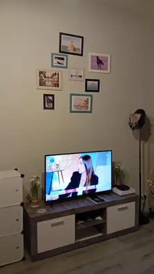 Télévision ou salle de divertissement dans l'établissement Smile