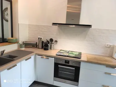 Cuisine ou kitchenette dans l'établissement LE CANGE