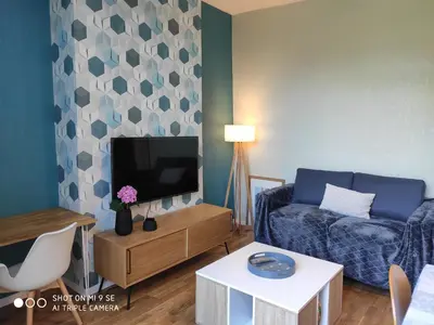 Télévision ou salle de divertissement dans l'établissement HORTILLON