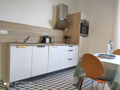 Cuisine ou kitchenette dans l'établissement HORTILLON