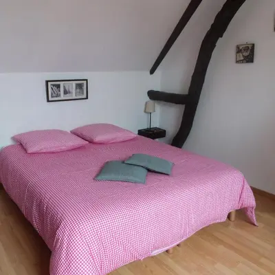 Un ou plusieurs lits dans un hébergement de l'établissement Gîte et Relais Equestre de Marie