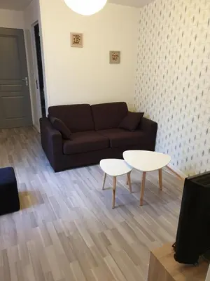 Coin salon dans l'établissement appartement tiago