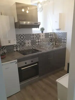 Cuisine ou kitchenette dans l'établissement Inobello proche Chateau Chantilly Parc Asterix