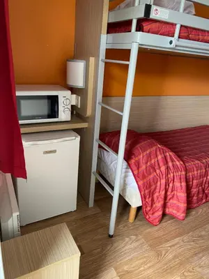 Un ou plusieurs lits dans un hébergement de l'établissement Premiere Classe Beauvais
