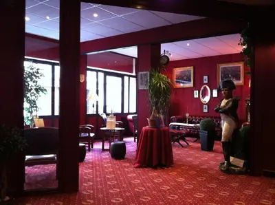 Coin salon dans l'établissement Hôtel 1er Consul Rouen