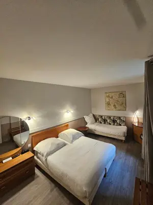 Un ou plusieurs lits dans un hébergement de l'établissement Hôtel 1er Consul Rouen