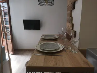 Télévision ou salle de divertissement dans l'établissement studi'home