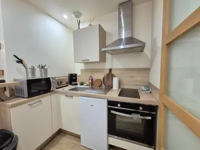 Cuisine ou kitchenette dans l'établissement studi'home