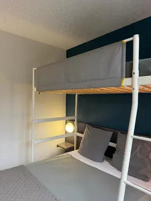 Un ou plusieurs lits dans un hébergement de l'établissement Hôtel La Nonette ASTERIX, CDG AIRPORT & PARIS CENTRE