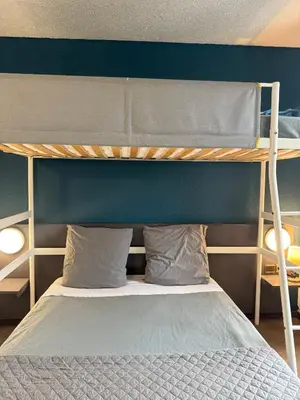 Un ou plusieurs lits dans un hébergement de l'établissement Hôtel La Nonette ASTERIX, CDG AIRPORT & PARIS CENTRE