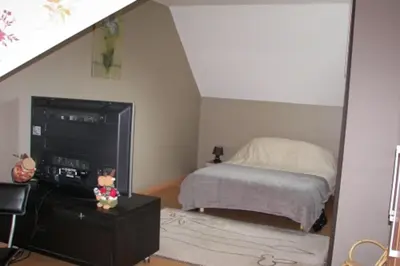 Un ou plusieurs lits dans un hébergement de l'établissement Chambres d'Hôtes Arques en Ciel