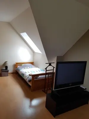 Télévision ou salle de divertissement dans l'établissement Chambres d'Hôtes Arques en Ciel