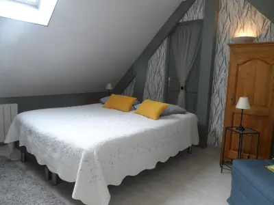 Un ou plusieurs lits dans un hébergement de l'établissement chambre d'hôte équipée en studio
