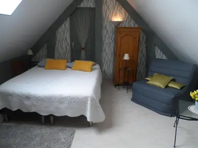 Un ou plusieurs lits dans un hébergement de l'établissement chambre d'hôte équipée en studio
