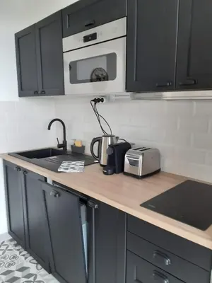 Cuisine ou kitchenette dans l'établissement COSYLOC studios