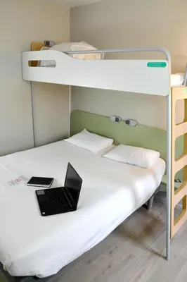 Un ou plusieurs lits dans un hébergement de l'établissement ibis budget Rouen Parc des Expos Zenith