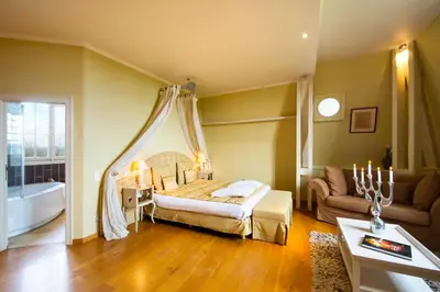Un ou plusieurs lits dans un hébergement de l'établissement Chateau-Hotel De Belmesnil