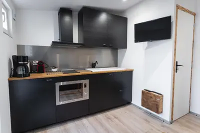 Cuisine ou kitchenette dans l'établissement La Dimiere - Le Postel - Appartements de standing en hyper-centre - Louviers