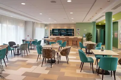 Restaurant ou autre lieu de restauration dans l'établissement Résidence DOMITYS - L'Athénée