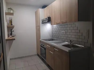 Cuisine ou kitchenette dans l'établissement Gite du nuage