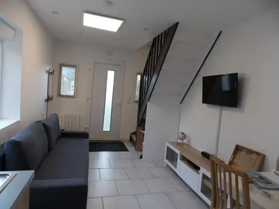 Télévision ou salle de divertissement dans l'établissement Gite du nuage
