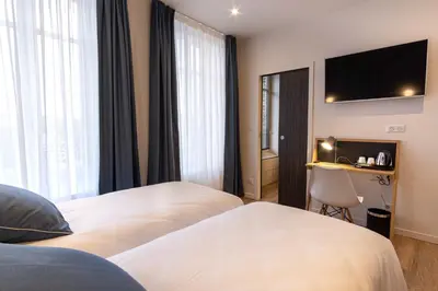 Un ou plusieurs lits dans un hébergement de l'établissement Mayrena Hotel Restaurant