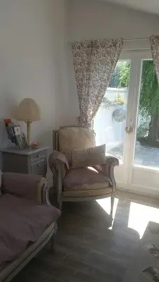 Coin salon dans l'établissement Les Trois Roses