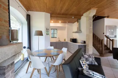 Coin salon dans l'établissement LA MAISON DES CHEVAUX