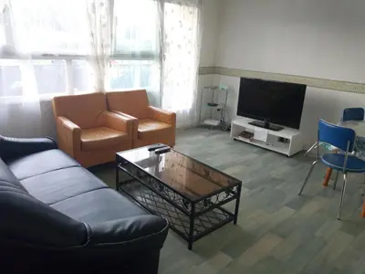Télévision ou salle de divertissement dans l'établissement Appartement lumineux proche de Rouen et Paris
