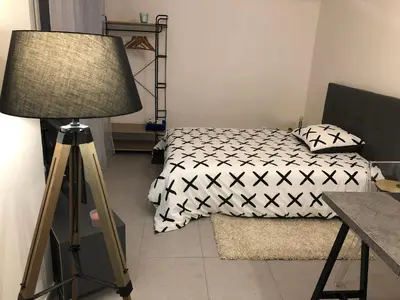 Un ou plusieurs lits dans un hébergement de l'établissement Studio 104