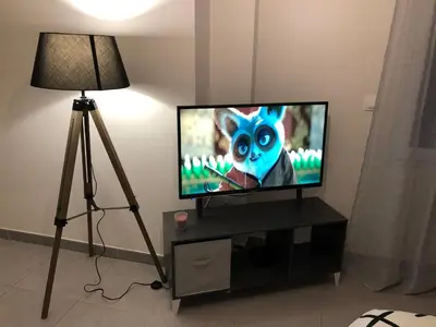 Télévision ou salle de divertissement dans l'établissement Studio 104