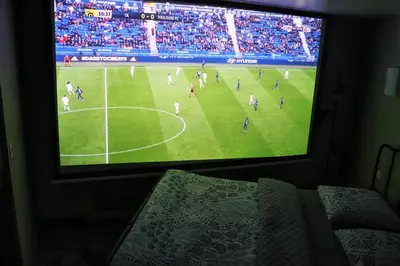 Télévision ou salle de divertissement dans l'établissement Suite Melody double balnéo, home-cinéma, terrasse à Dieppe