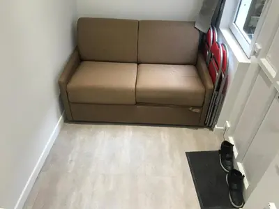 Coin salon dans l'établissement Petit T2 hypercentre avec terrasse privée - 006