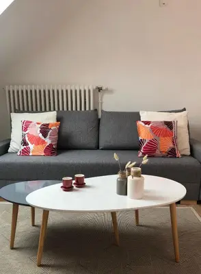 Coin salon dans l'établissement Ginkgo Maison d'hôtes