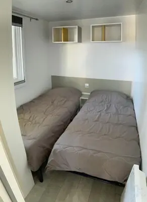 Un ou plusieurs lits dans un hébergement de l'établissement Camping VITAMIN DIEPPE
