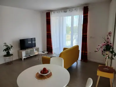 Télévision ou salle de divertissement dans l'établissement Résidence NOVAGE - Amiens